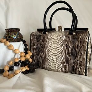 Larger size shiny fake snakeskin purse.